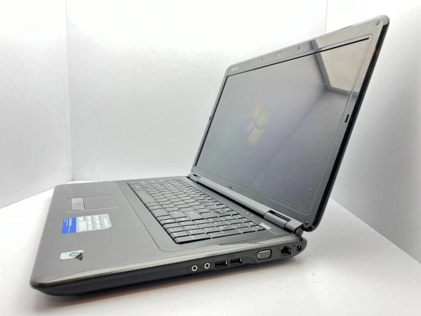 Ноутбук Asus K70IJ / 17.3&quot; (1600x900) TN / Intel Core 2 Duo T6600 (2 ядра по 2.2 GHz) / 4 GB DDR2 / 320 GB HDD / Intel HD Graphics / WebCam - 4