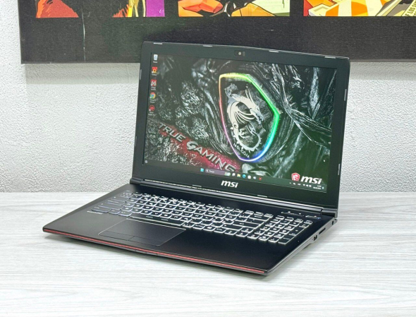 Игровой ноутбук MSI MegaBook GP62 / 15.6&quot; (1920x1080) TN / Intel Core i7-7700HQ (4 (8) ядра по 2.8 - 3.8 GHz) / 16 GB DDR4 / 128 GB SSD + 1000 GB HDD / nVidia GeForce GTX 1060, 3 GB GDDR5, 192-bit / WebCam - 4