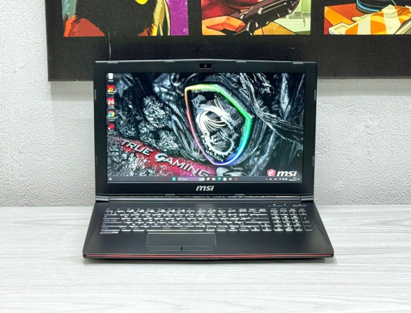 Игровой ноутбук MSI MegaBook GP62 / 15.6&quot; (1920x1080) TN / Intel Core i7-7700HQ (4 (8) ядра по 2.8 - 3.8 GHz) / 16 GB DDR4 / 128 GB SSD + 1000 GB HDD / nVidia GeForce GTX 1060, 3 GB GDDR5, 192-bit / WebCam - 2