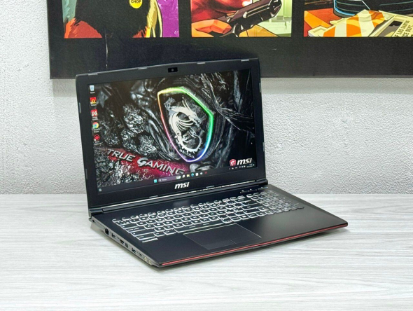 Игровой ноутбук MSI MegaBook GP62 / 15.6&quot; (1920x1080) TN / Intel Core i7-7700HQ (4 (8) ядра по 2.8 - 3.8 GHz) / 16 GB DDR4 / 128 GB SSD + 1000 GB HDD / nVidia GeForce GTX 1060, 3 GB GDDR5, 192-bit / WebCam - 3